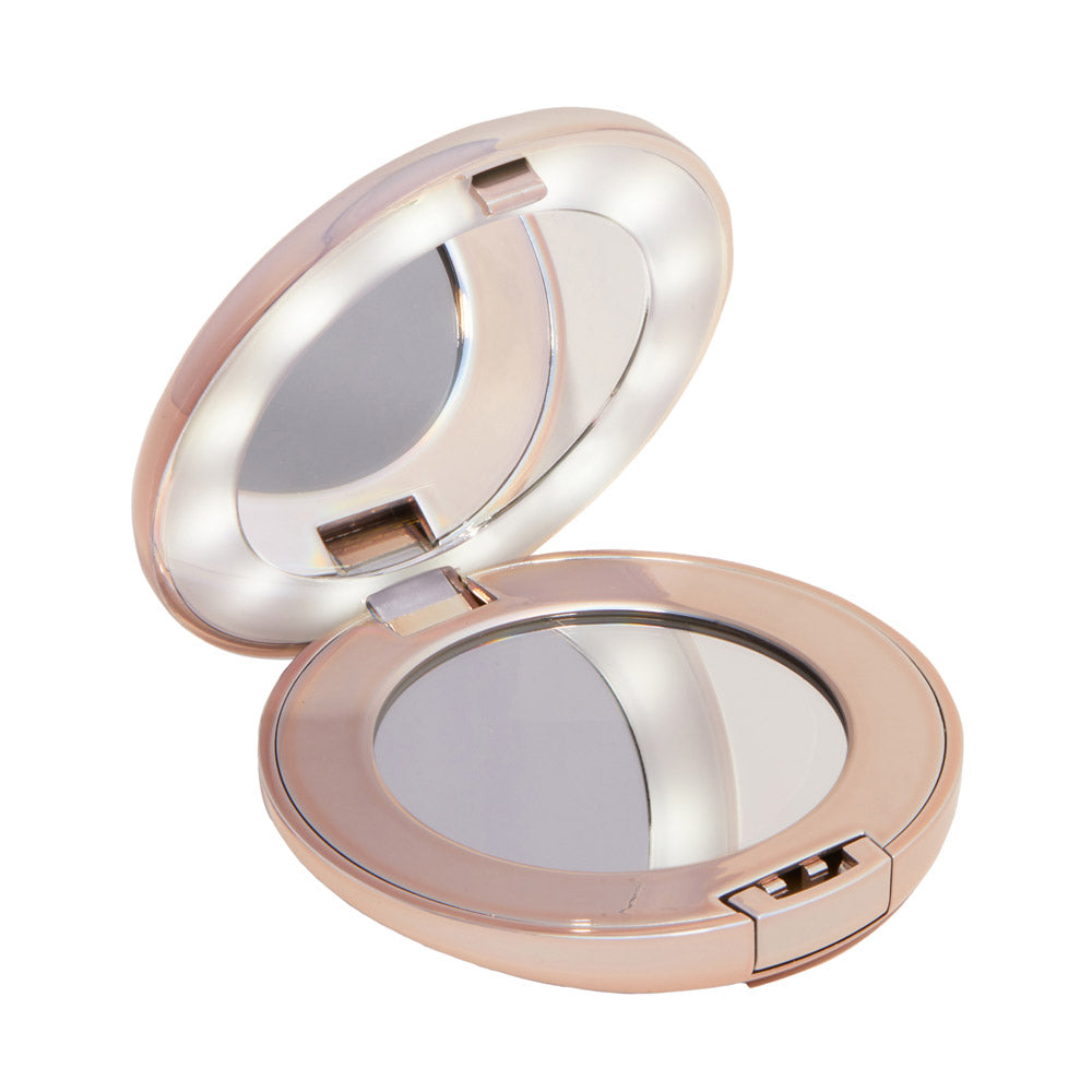 The glamnetic Compact Mirror in rose gold features two round mirrors—one with magnification—and a built-in LED light ring around the lid mirror for clear viewing. - Product image