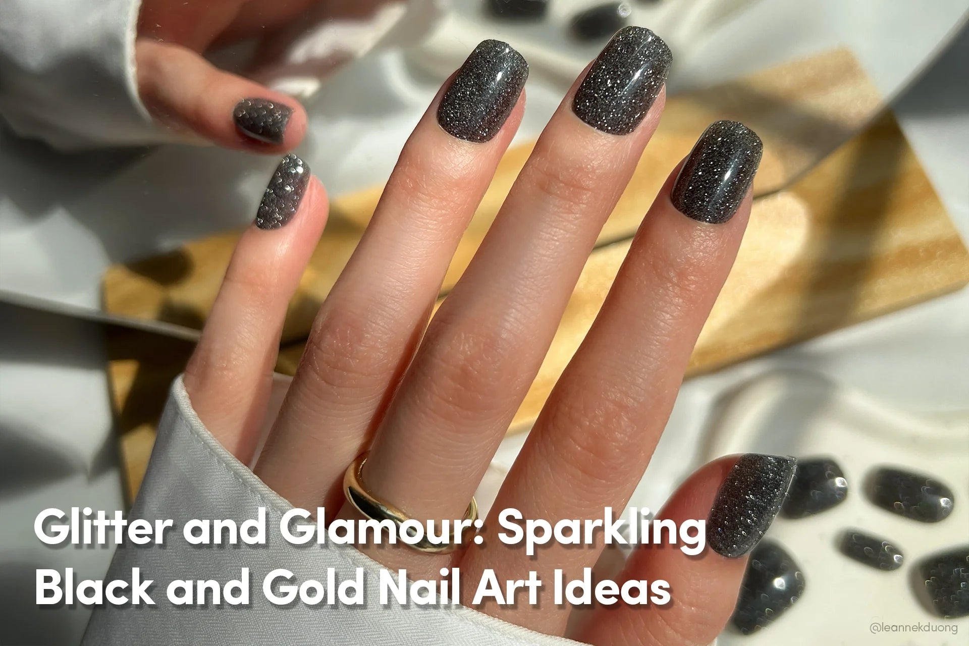 Glitter and Glamour: Sparkling Black and Gold Nail Art Ideas