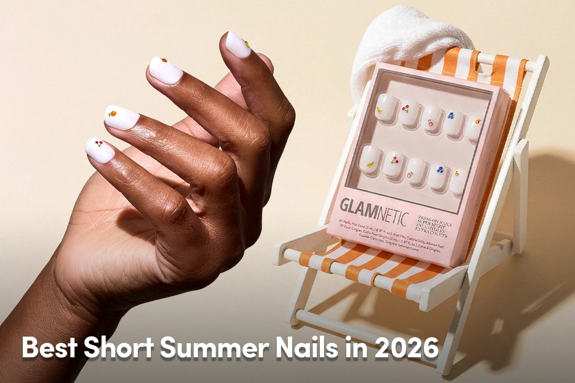 Short white press-on nails with tiny fruit nail art.