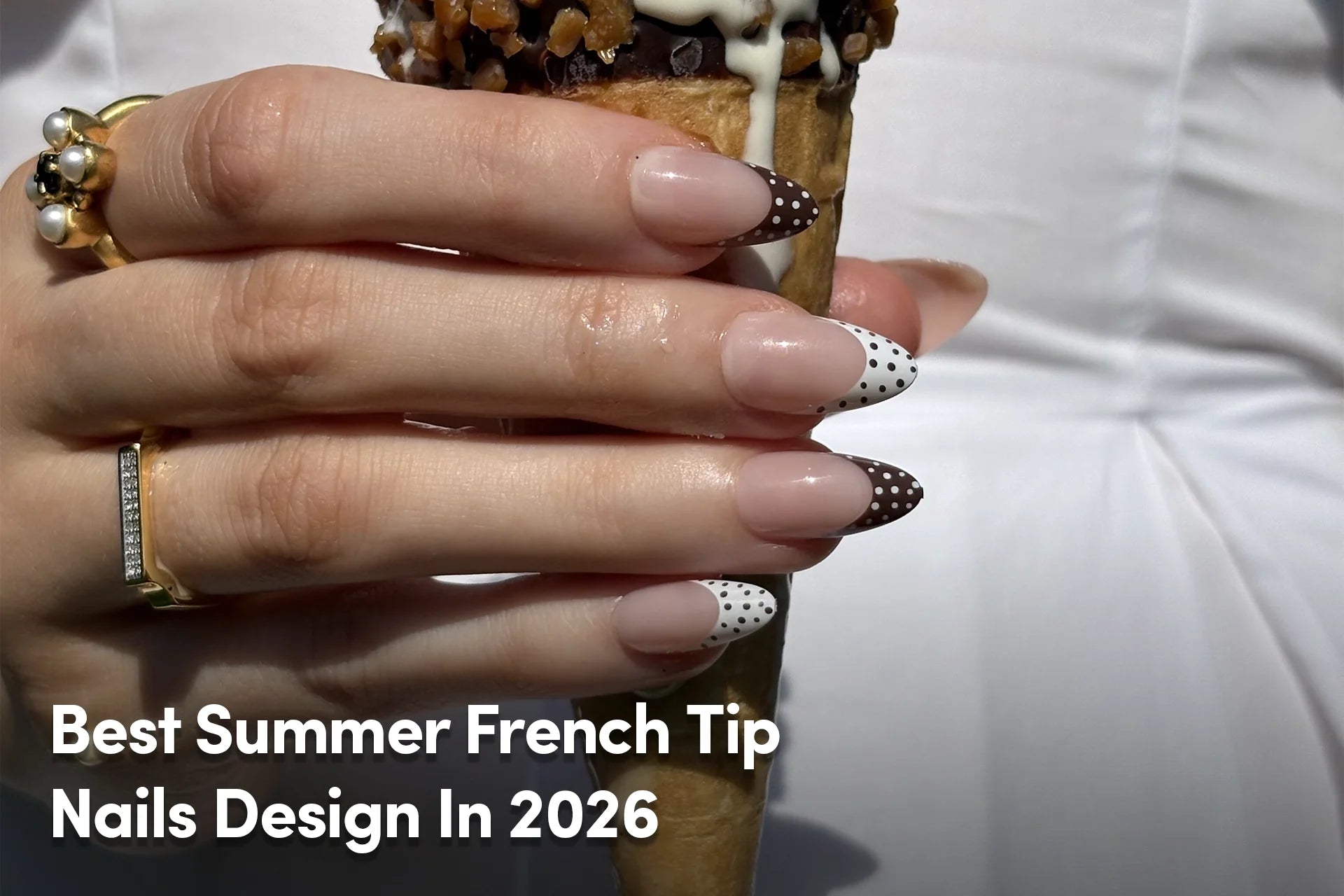Brown polka dot French tip nails