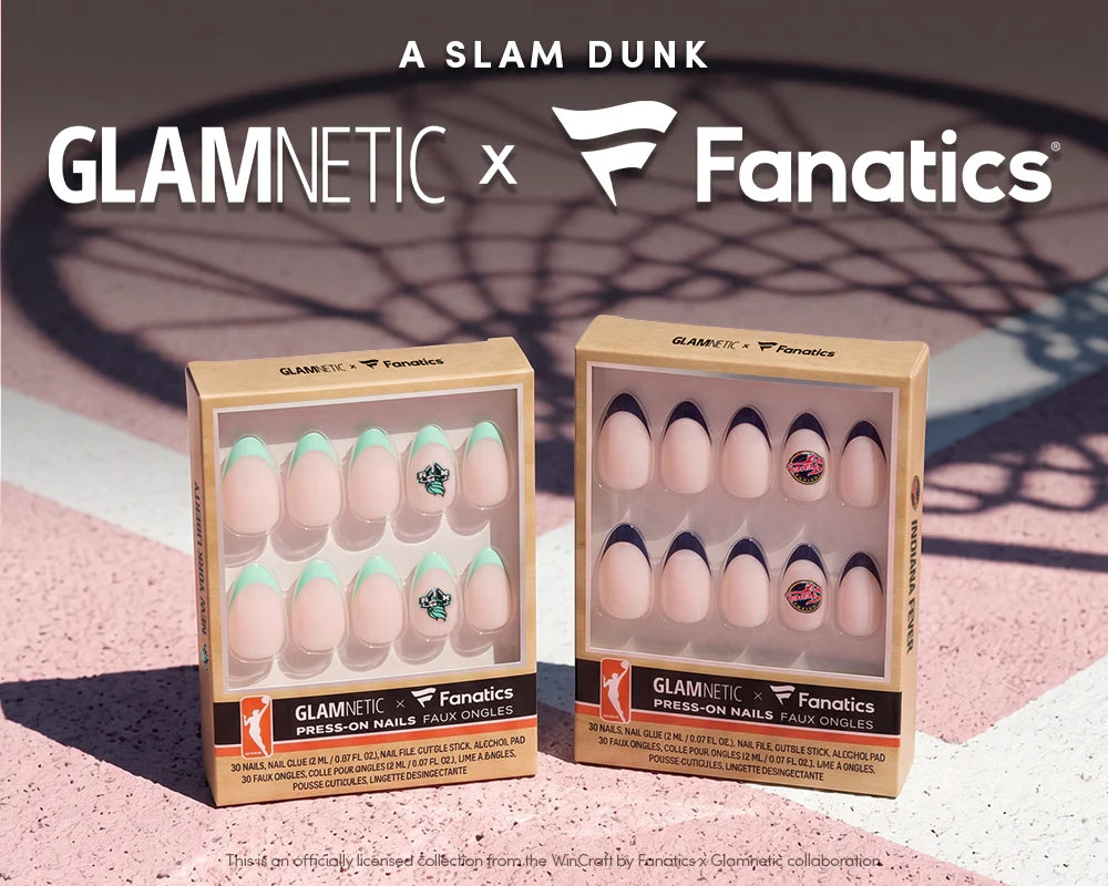 Two boxes of Glamnetic x Fanatics NBA press-on nails sit on a pink basketball court, with a basketball hoop shadow cast over them. Text above reads, “A Slam Dunk. GLAMNETIC x Fanatics.”.