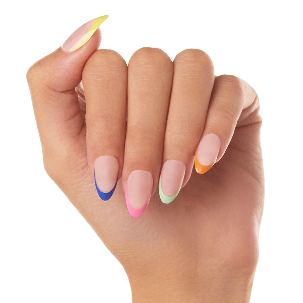 Glamnetic’s Sprinkles press-on nails feature an almond shape and a colorful French tip manicure—yellow, blue, pink, green, and orange tips—shown against a plain white background. - Product image