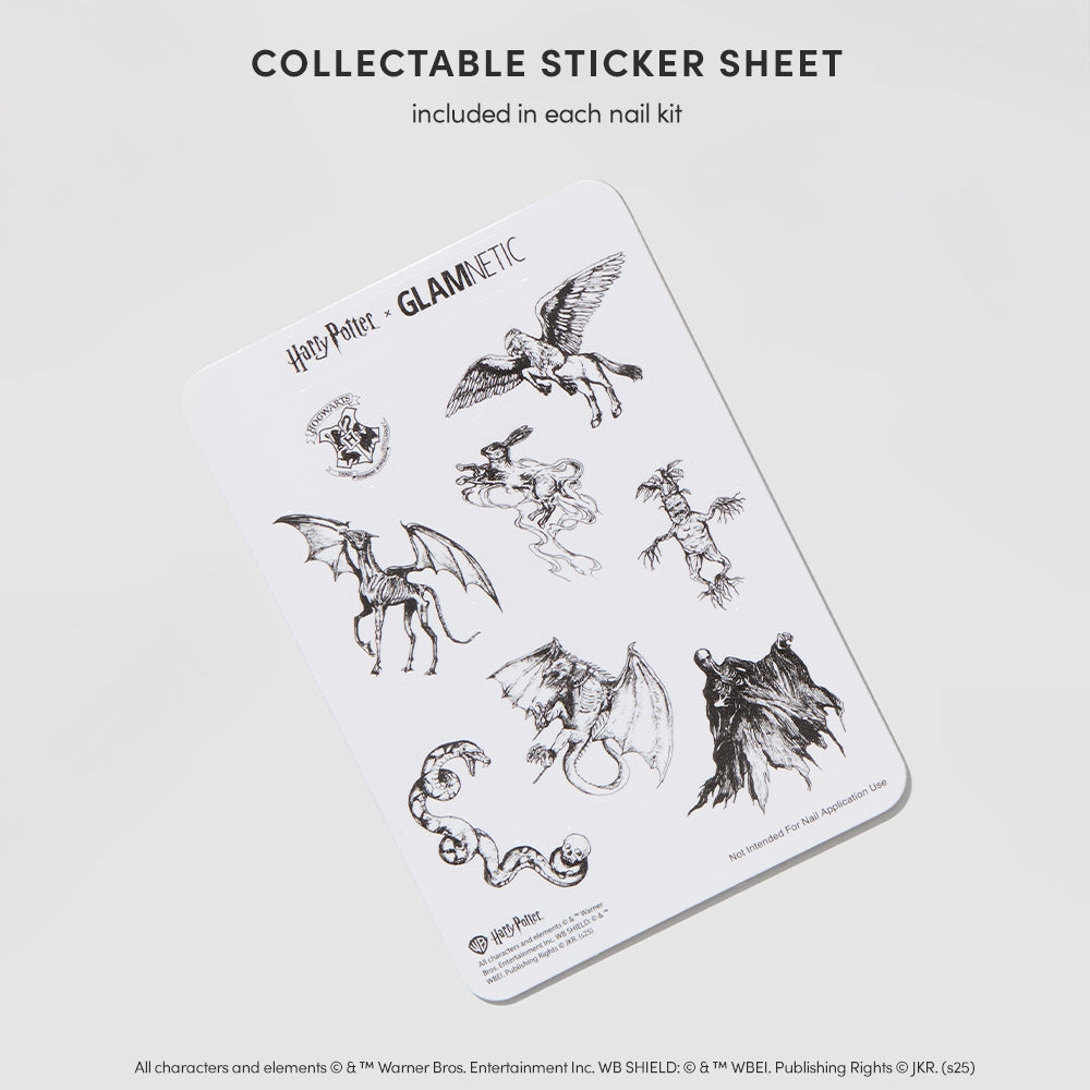 The glamnetic Harry Potter™ x Glamnetic PR Box includes a Collectable Sticker Sheet with black-and-white Harry Potter-themed sketches—Hippogriff, Thestral, Dementor, and the Hogwarts crest—on white. - Product image