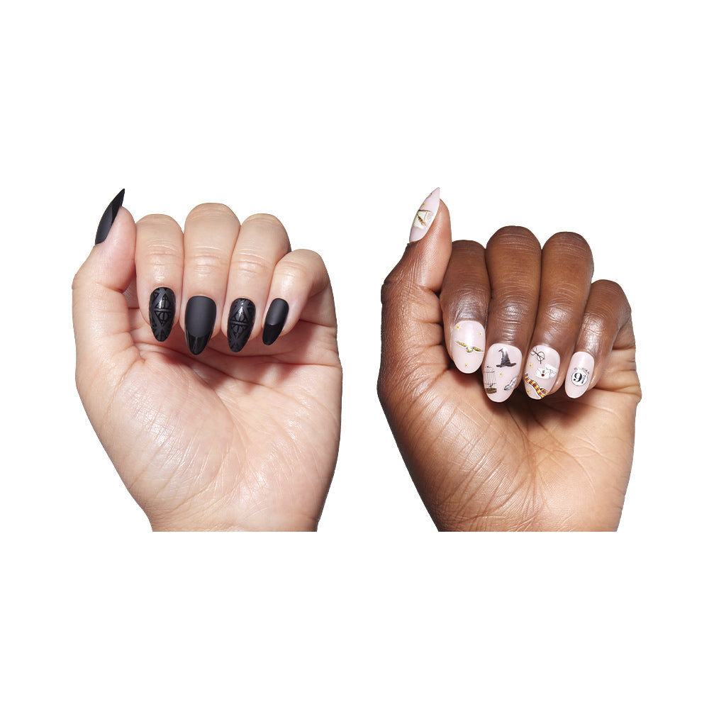 Two hands feature glamnetics Hogwarts™ Spirit nails: the left shows matte black nails with Deathly Hallows-inspired art, while the right displays light nude nails adorned with black, gold, and white patterns. - Product image