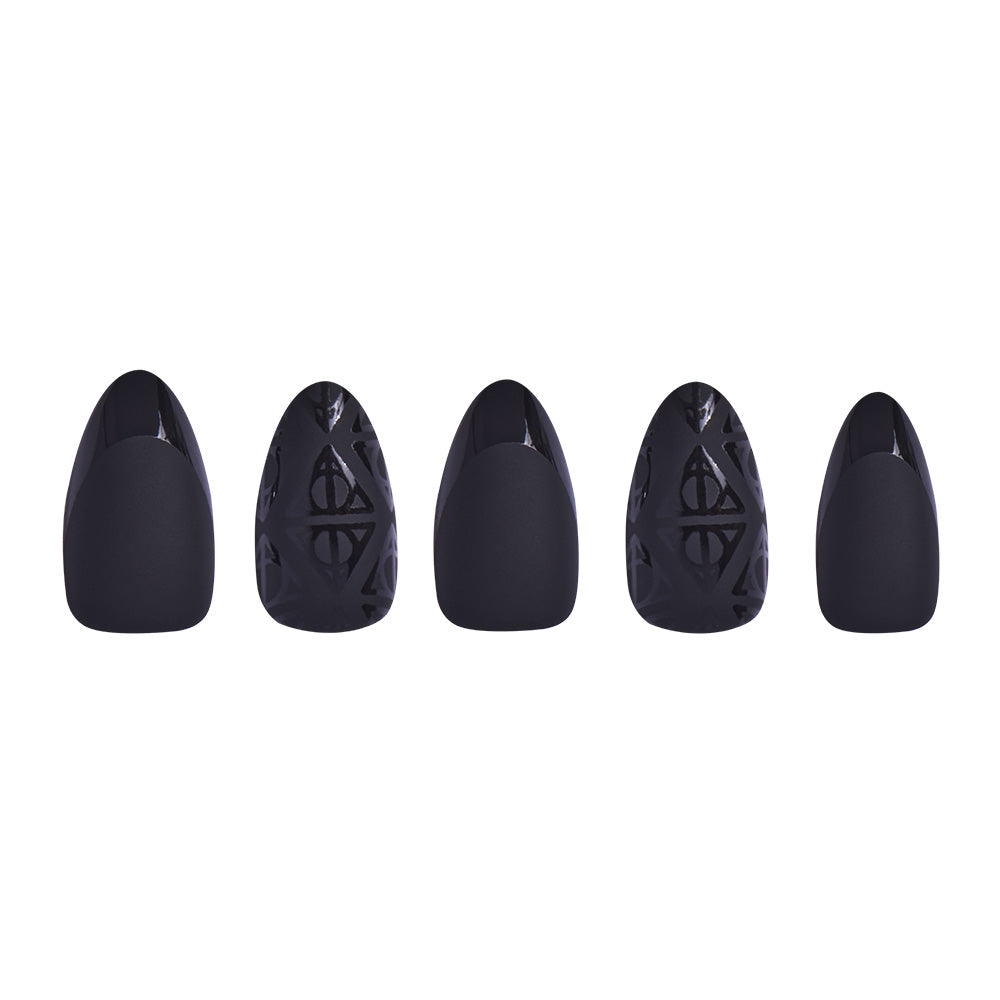 Five black, oval-shaped nails with smooth and lattice-patterned surfaces from glamnetic’s Deathly Hallows™ set are arranged in a row on a white background, inspired by the Wizarding World. - Product image