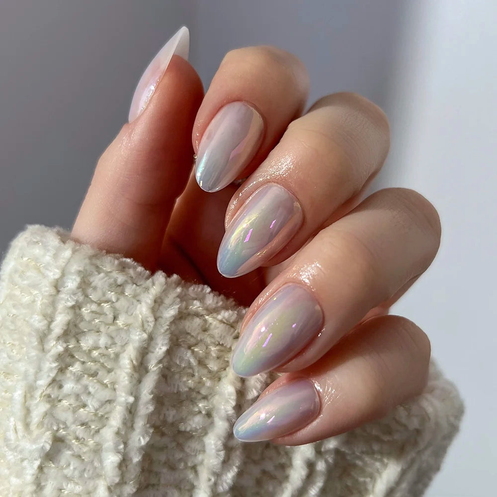 Entranced short almond nails with a glossy, iridescent pearlescent finish by Glamnetic.