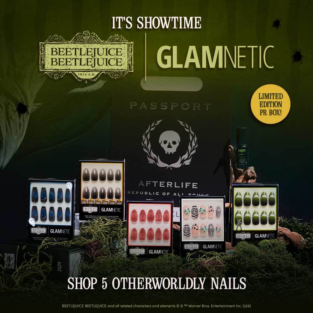 A display of Beetlejuice x Glamnetic press-on nails in five themed sets, surrounded by fog, moss, and props. Text reads: It’s Showtime. Shop 5 otherworldly nails. Limited edition PR box!.