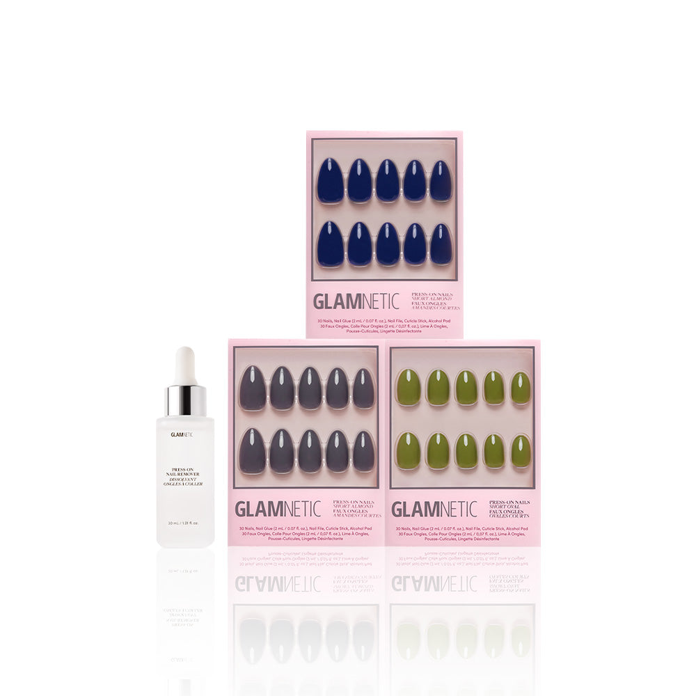 Three boxes of glamnetic Nature Lover press-on nails are arranged next to a white bottle of nail serum with a dropper, all set on a white background. - Product image