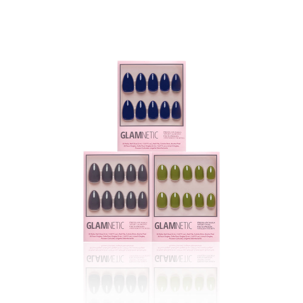 Three boxes of glamnetic Nature Lover press-on nails in pink packaging are arranged in a pyramid shape on a white background. - Product image