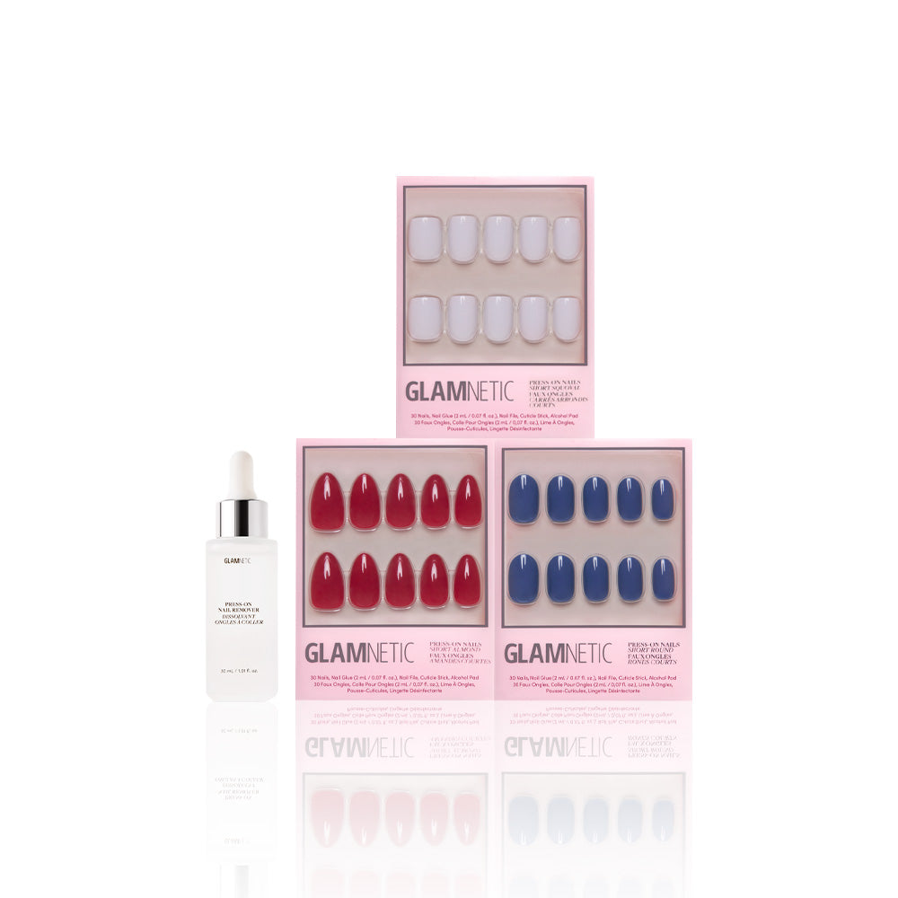 Three sets of glamnetic Royal Decadence press-on nails in pink packaging are shown on a white background, with a dropper bottle of nail glue or serum beside them. - Product image