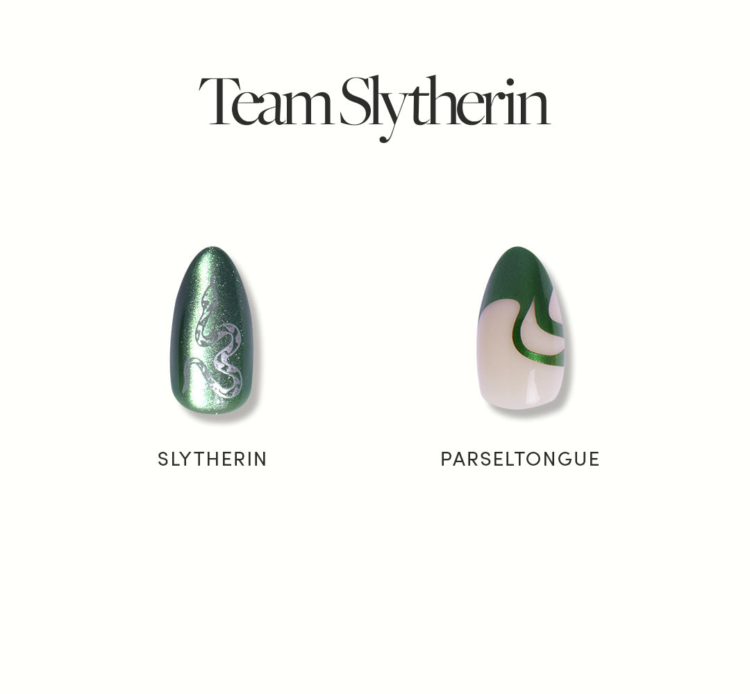 Team Slytherin™ by glamnetic features two almond nails: one emerald green with a silver snake and SLYTHERIN, the other with green and beige swirls labeled PARSELTONGUE. Vegan and cruelty free.