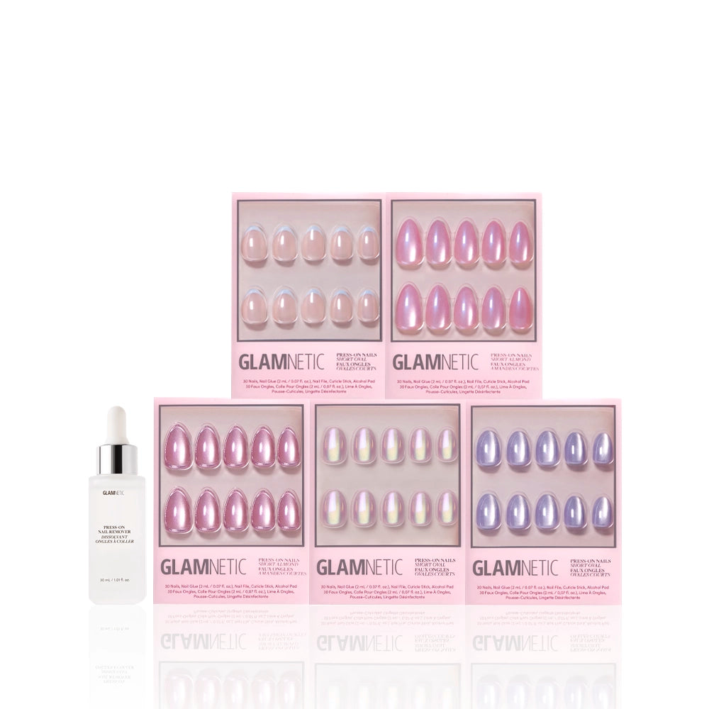 Five boxes of glamnetic’s Shimmering Shores pink and purple press-on nails, with glazed and velvet finishes, are arranged in two rows beside a white dropper bottle, all set against a white background. - Product image