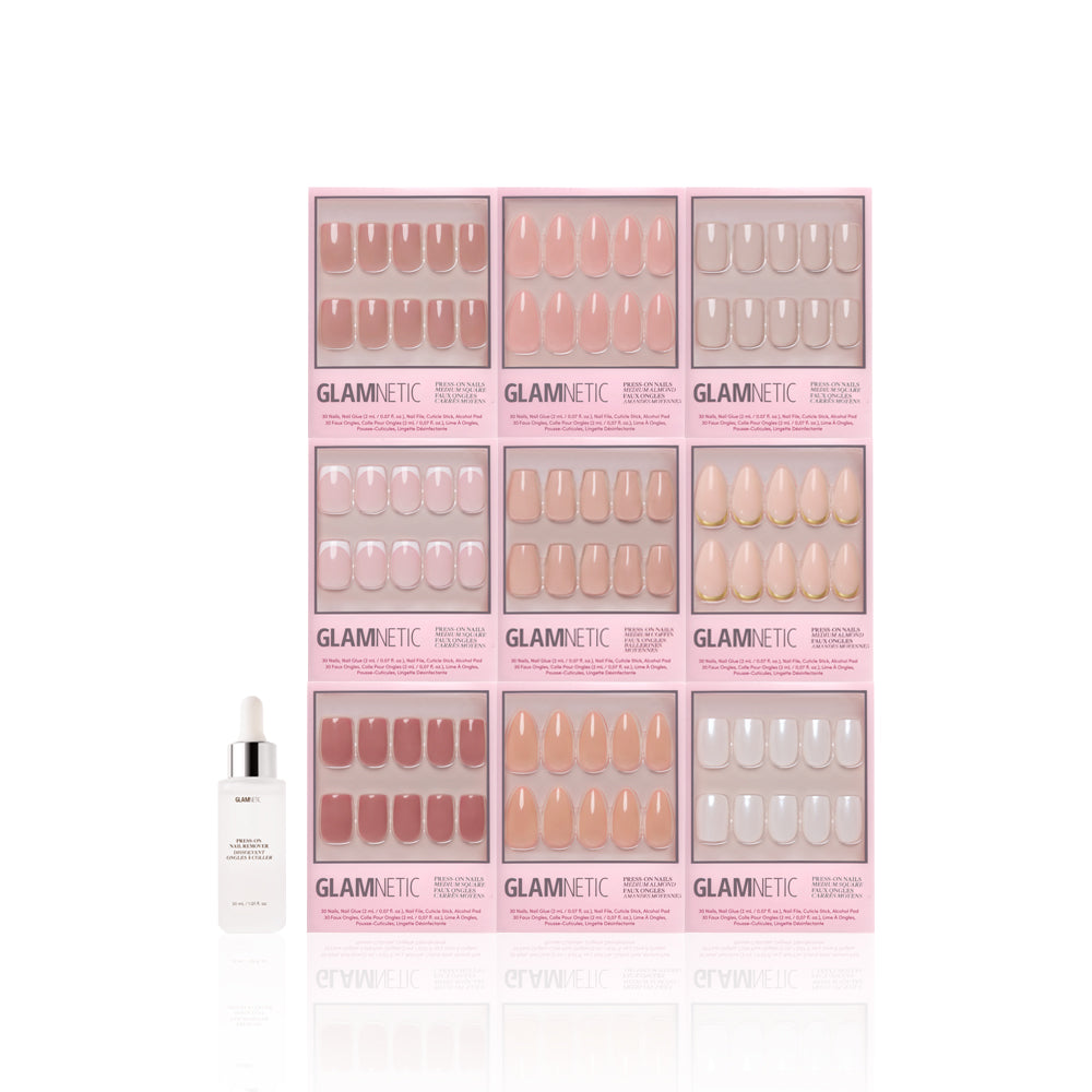 Nine boxes of glamnetic’s Timeless Tones Collection press-on nails in pink and nude are neatly arranged in a grid, with a white cuticle oil bottle in front. Each set offers salon-quality thickness for a flawless, professional look. - Product image