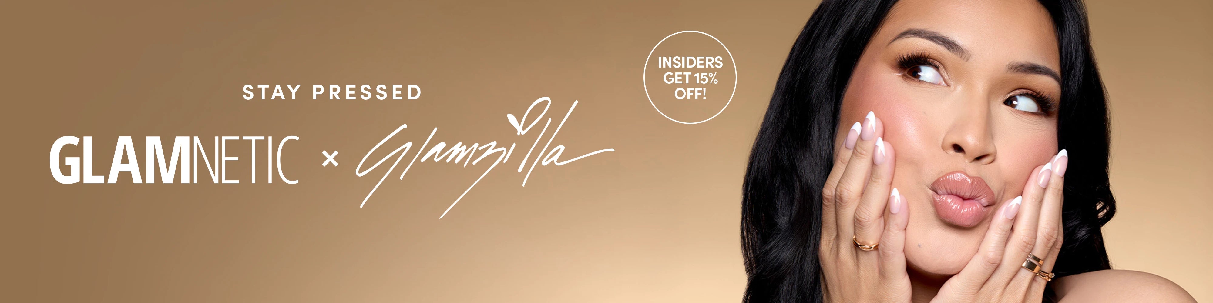 Model wearing soft pink Glamnetic x Glamlzilla press-on nails poses against a beige background with hands on cheeks. Text on image reads ‘Stay Pressed – Glamnetic x Glamlzilla’ and ‘Insiders get 15% off.
