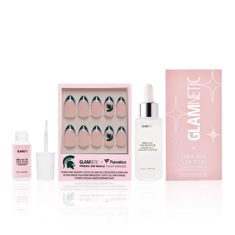 The Michigan State Spartans Gameplan by glamnetic is a press-on nail set with green tips, perfect for game day, and comes with nail glue, Press-on nail remover, plus Glamnetic Adhesive Nail Tabs in the box.