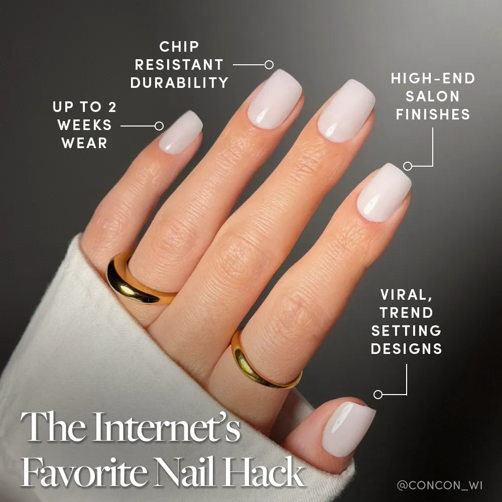 A hand with neatly manicured, light pink nails wears two gold rings. Text highlights glamnetic Clean Cut press-ons: chip-resistant durability, up to 2 weeks wear, salon-quality finish, and trendy viral milky mani designs. - Product image
