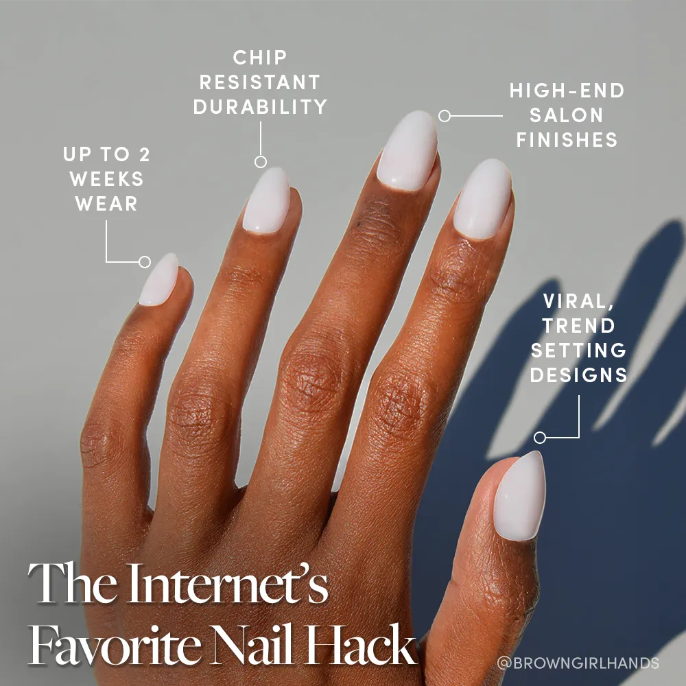 A hand with neatly manicured Clean Girl white short oval nails by glamnetic is shown against a plain gray background, featuring chip-resistant durability, high-end finish, up to 2 weeks' wear, and trend-setting design. - Product image