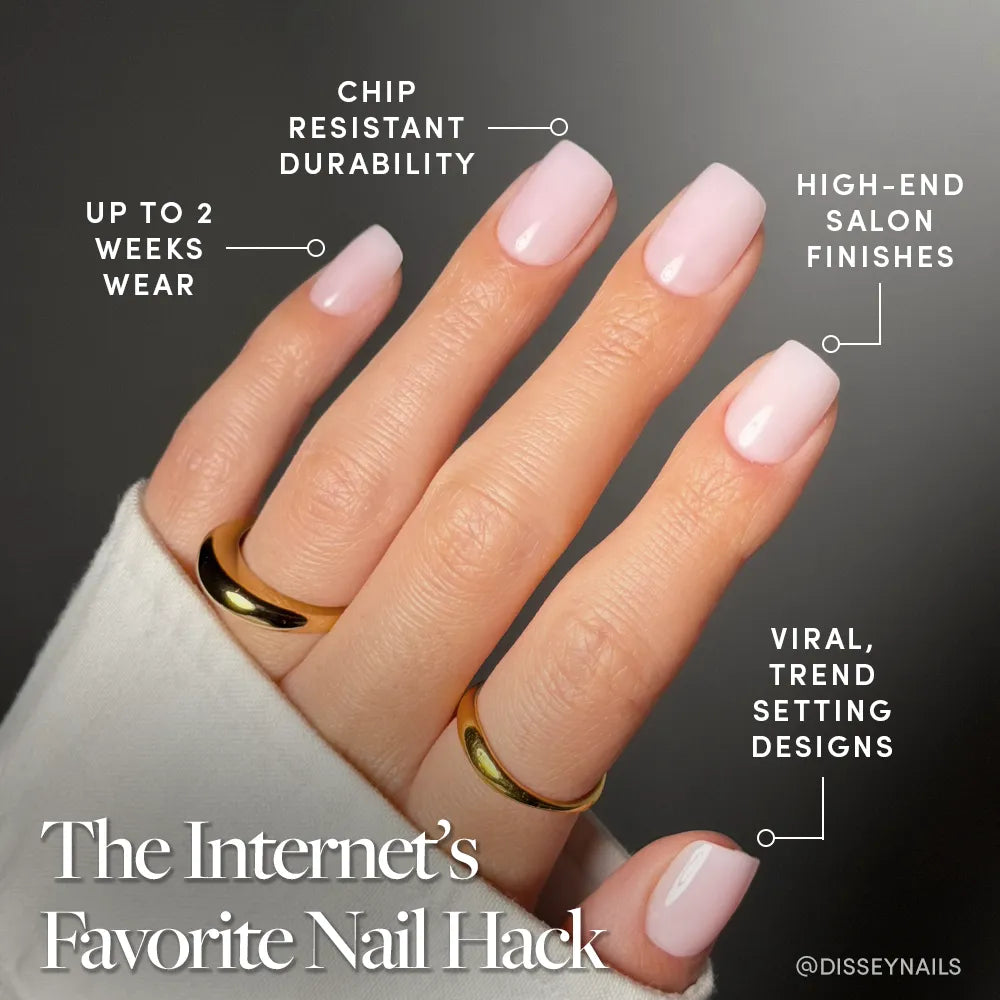 A hand with light pink, short squoval nails in glamnetic’s Soft Girl wears two gold rings. Text highlights salon-quality, chip-resistant durability, high-end finish, viral designs, and up to two weeks of wear. - Product image