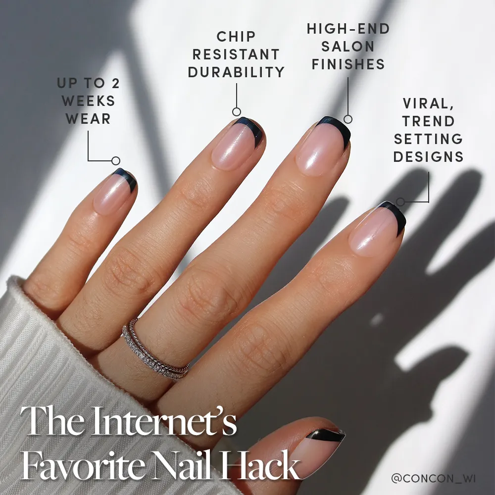 A hand with a black French manicure features Glamnetic Squid Ink Press-On Nails, showcasing glossy glazed tips. Enjoy chip-resistant, salon-quality nails with up to 2 weeks’ wear and on-trend, viral designs—the Internet’s favorite nail hack. - Product image