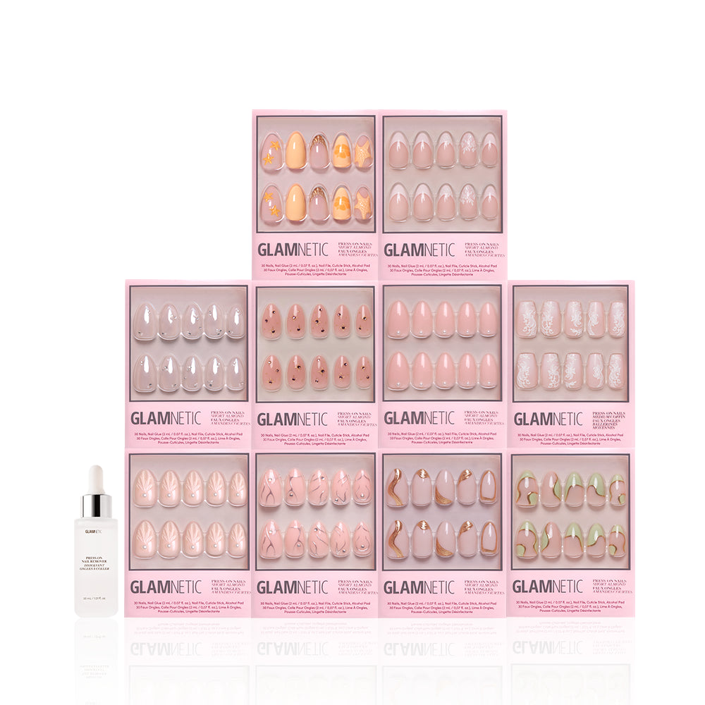 Eleven sets of glamnetic It's Giving More Dimension press-on nails in pink boxes are stacked pyramid-style with a small white dropper bottle in front—ideal for anyone craving trendy 3D nail designs, all set against a white background. - Product image