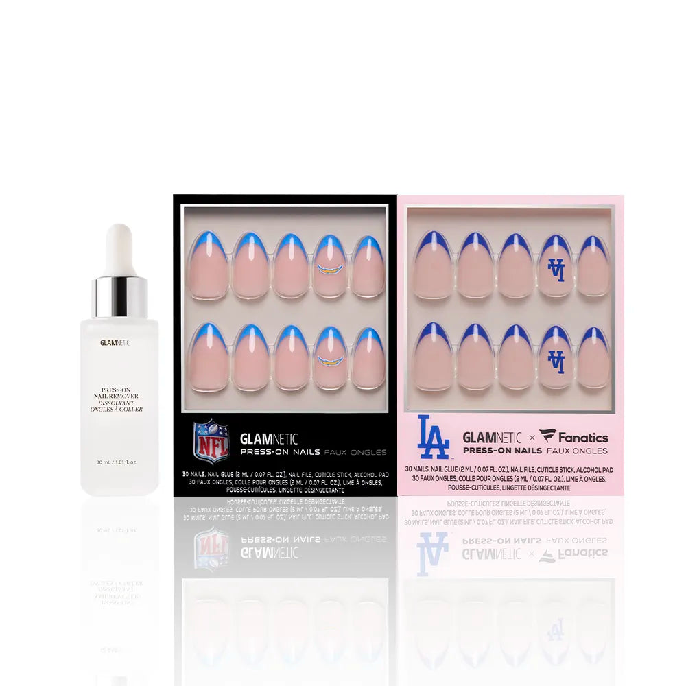 A bottle of glamnetic cuticle oil sits beside officially licensed sports nail sets, including glamnetic Los Angeles All-Stars press-on nails and blue-accented glamnetic Los Angeles Chargers press-on nails with team logos. - Product image