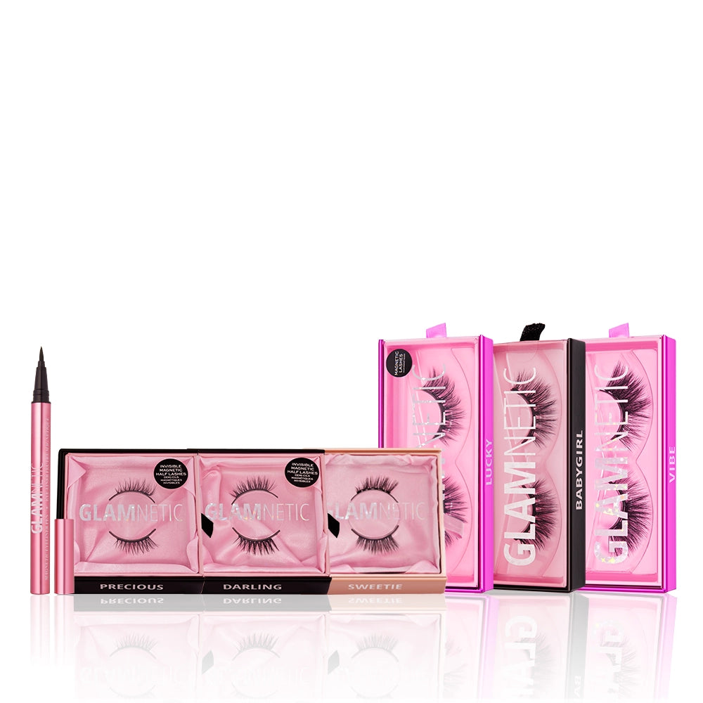 The glamnetic Lash Out Loud set includes three reusable magnetic lashes, two large single lash boxes, and a pink eyeliner pen—all in stylish pink packaging and arranged on a white background. - Product image