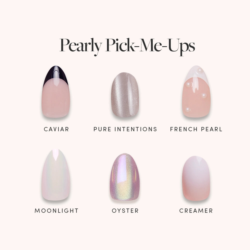 The glamnetic Pearly Pick-Me-Ups nail set features six almond-shaped press-ons in soft, pearly pastel and nude shades with subtle pearl accents, perfect for an elegant look against a cream background.
