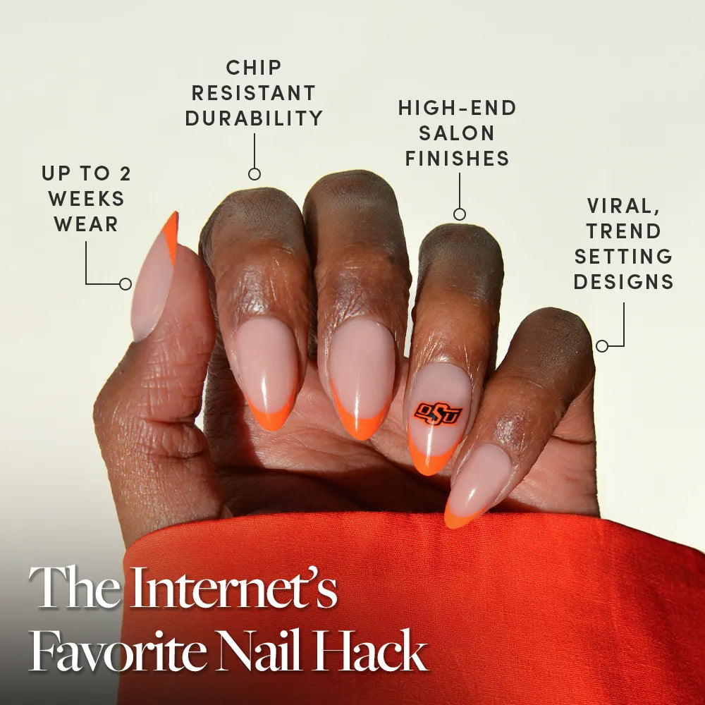 The glamnetic Oklahoma State Cowboys Press-On Nail Set features almond-shaped nudes with bright orange French tips and an OSU logo accent. Enjoy salon-quality, trendy game day nails that last up to two weeks. - Product image