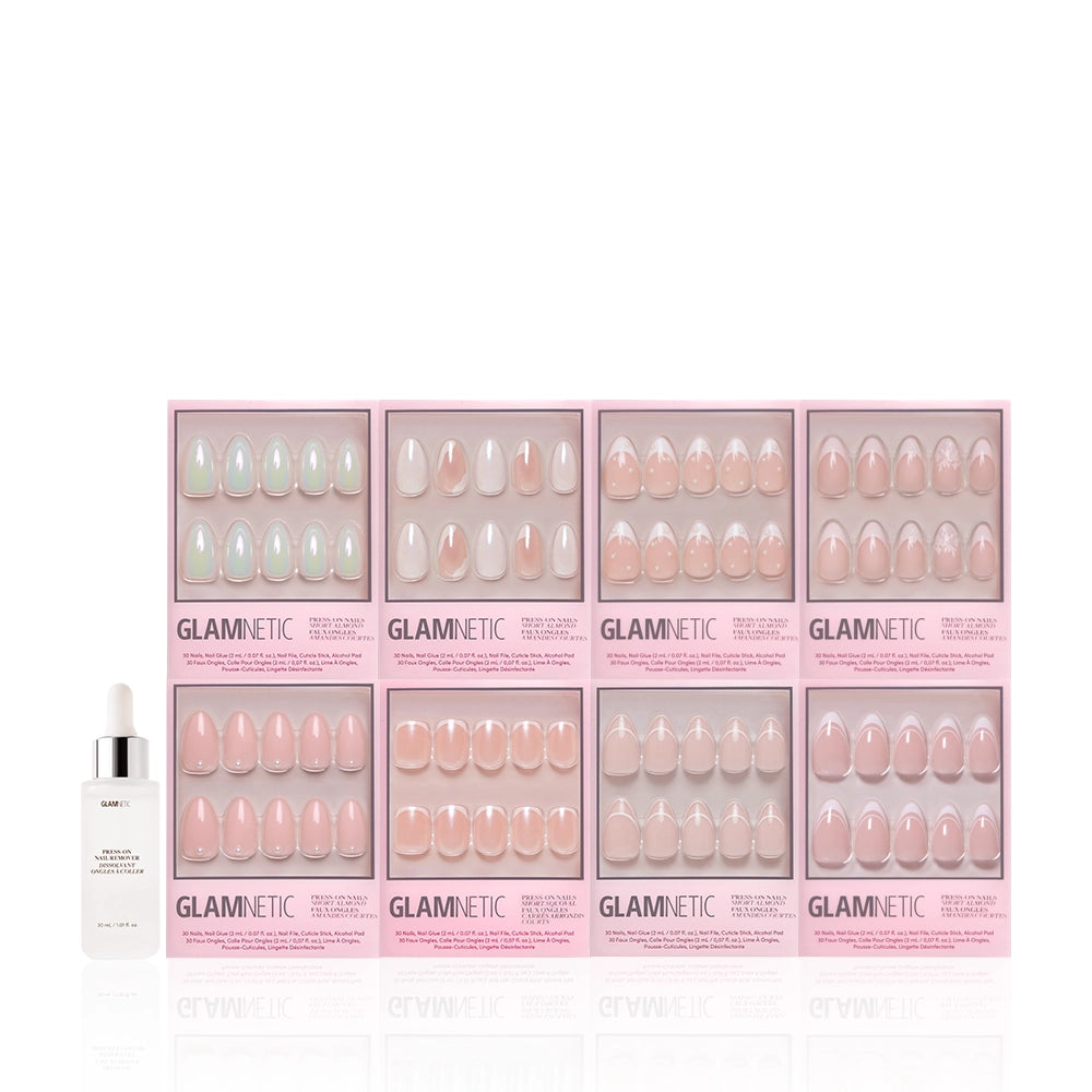 The glamnetic Hopeless Romantic Bundle features eight press-on nail sets in pink and nude, including classic French tips and short almond styles with 3D pearl accents, arranged in two rows and paired with a bottle of nail glue on the left. - Product image