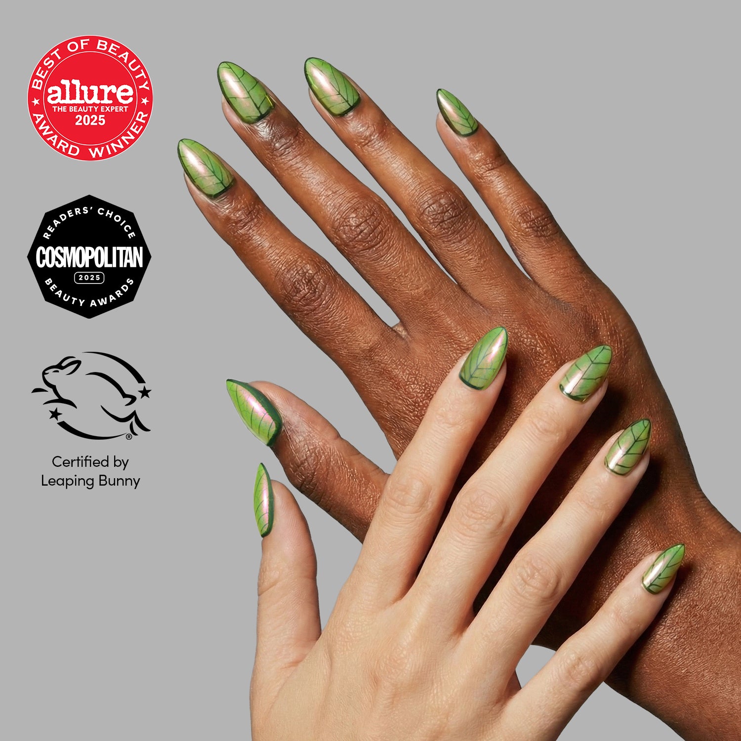 Two hands with green, leaf-inspired nail art using glamnetic’s Mandrake Nail Set are shown on a gray background. Allure and Cosmopolitan award badges, plus a Leaping Bunny cruelty-free logo, appear on the left.