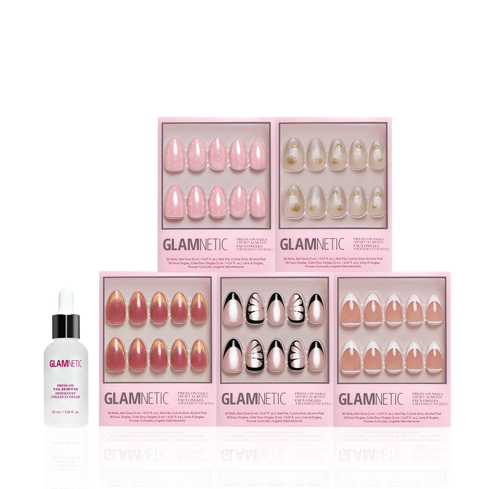 Six boxes of glamnetic Almond Atelier press-on nails, featuring short almond shapes in assorted pink and nude designs, are arranged in two rows with a glamnetic nail glue bottle to the left. Chic nails come in stylish pink packaging. - Product image