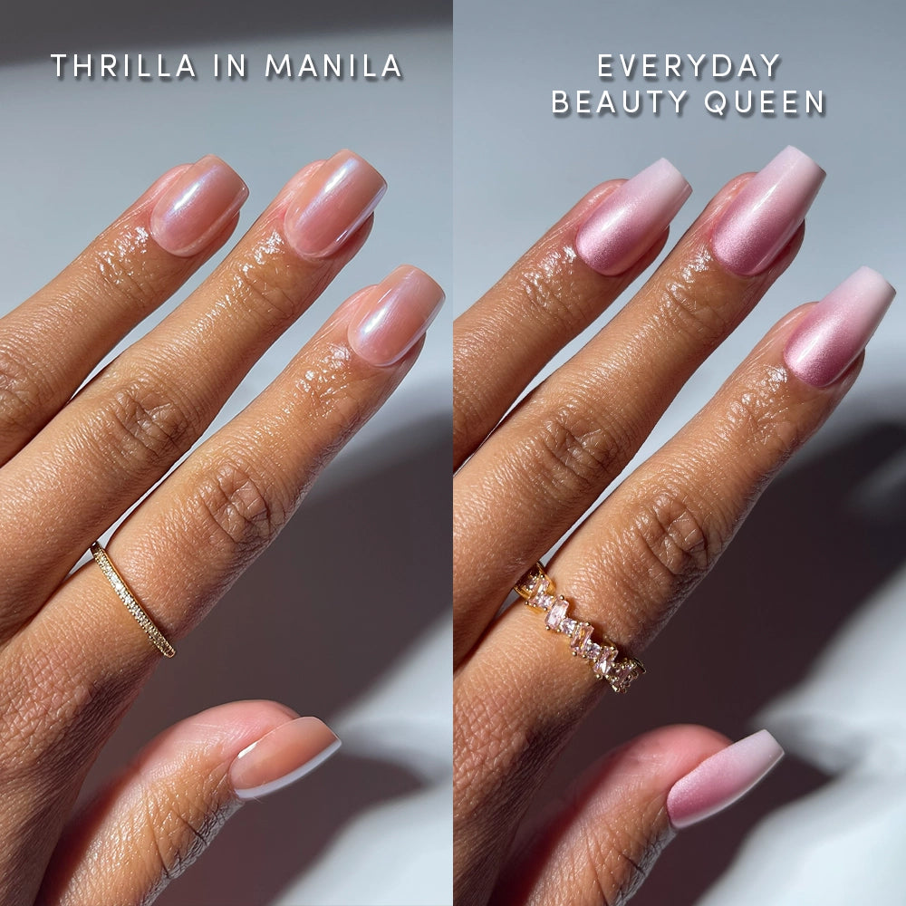 Side-by-side close-up of manicured hands—one with glossy pale pink press-ons labeled CORNER OFFICE by glamnetic, the other with shimmery pink squoval nails. Both hands are adorned with delicate rings.