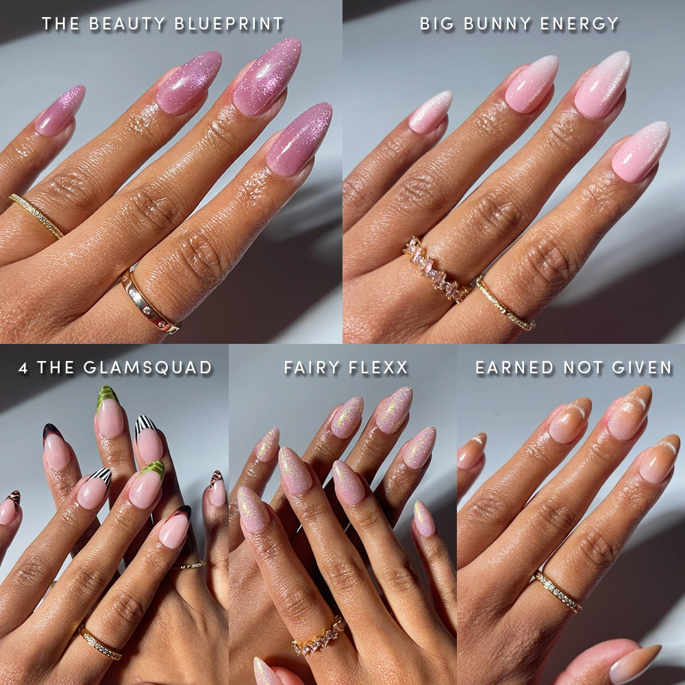 A collage of six manicured hands displays salon-quality FOR THE ALMOND GWORLS press-on nails by glamnetic, featuring pink glitter, pastel pink, French tips, swirls, subtle shimmer, and light pink ombré—each labeled for style.