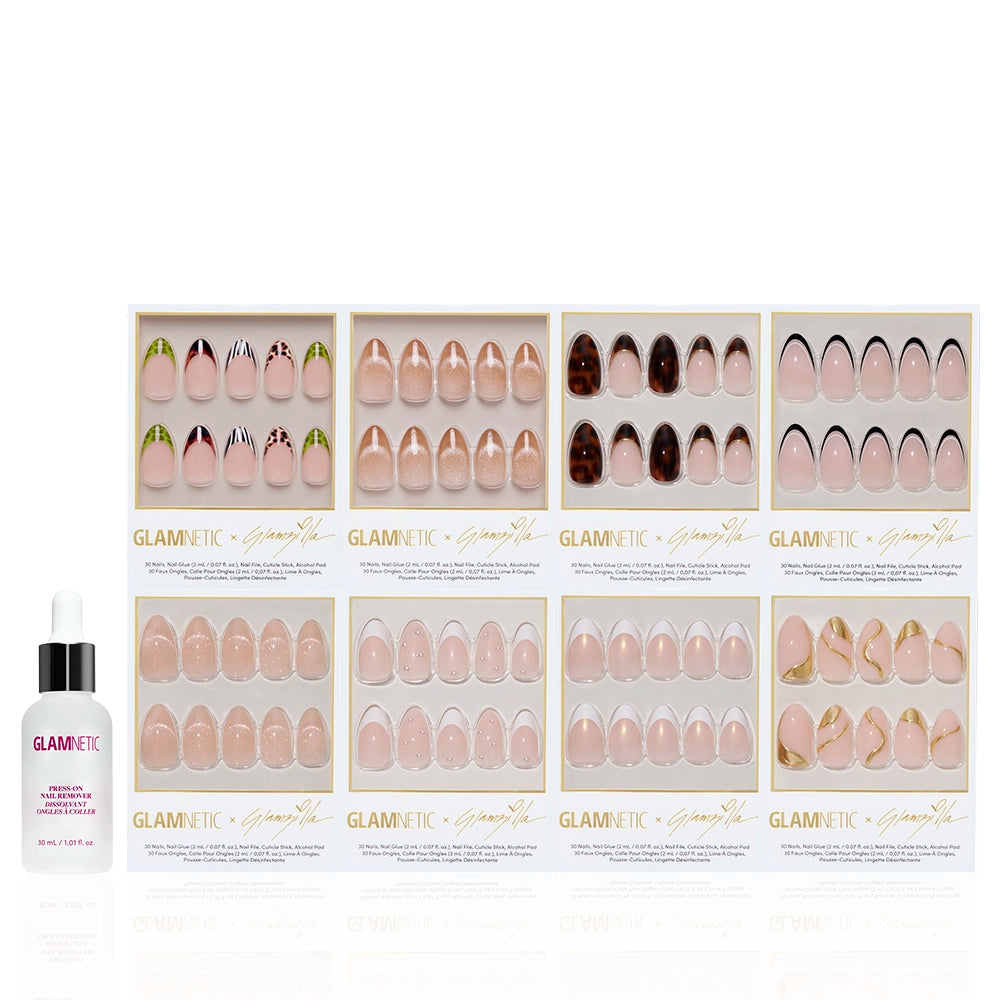 A set of nine glamnetic LA RICH BI$H press-on nails in various nude and decorative styles, including French tips, arranged in boxes over three rows with a small bottle of glamnetic nail glue on the left. - Product image