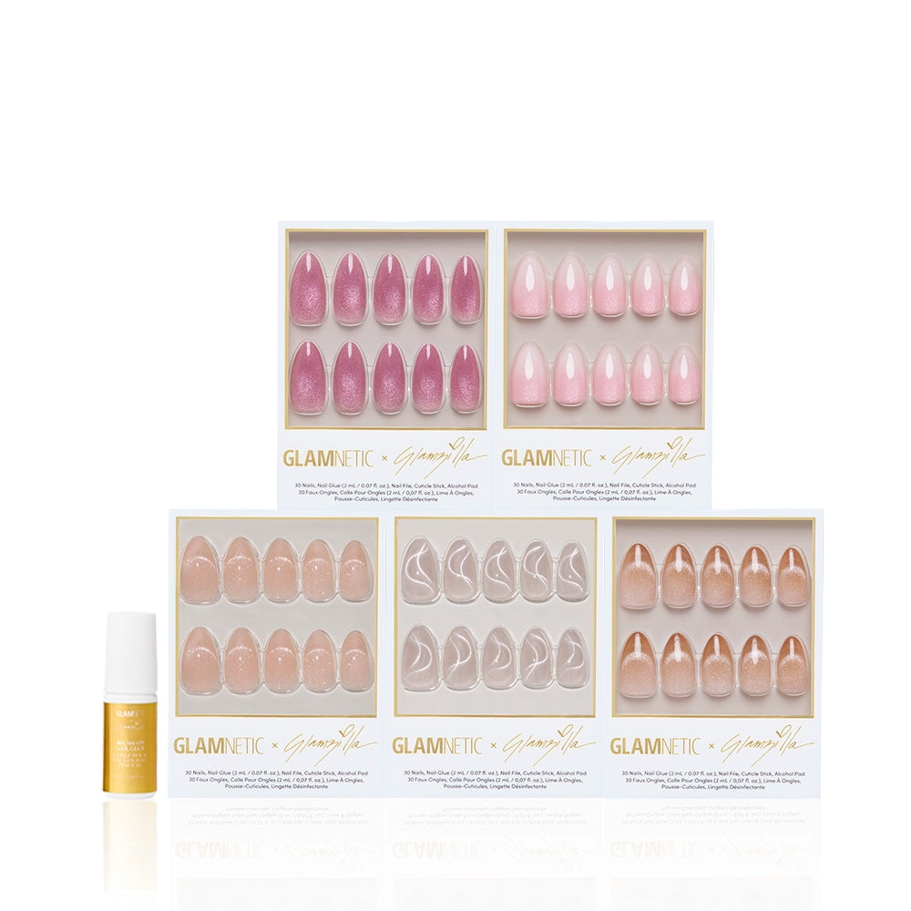 Five boxes of glamnetic STRICTLY VELVETS press-on nails in pink and nude shades, with almond mani shapes and shimmery velvet finishes, are arranged in two rows; a small gold and white bottle sits on the left in front of them. - Product image