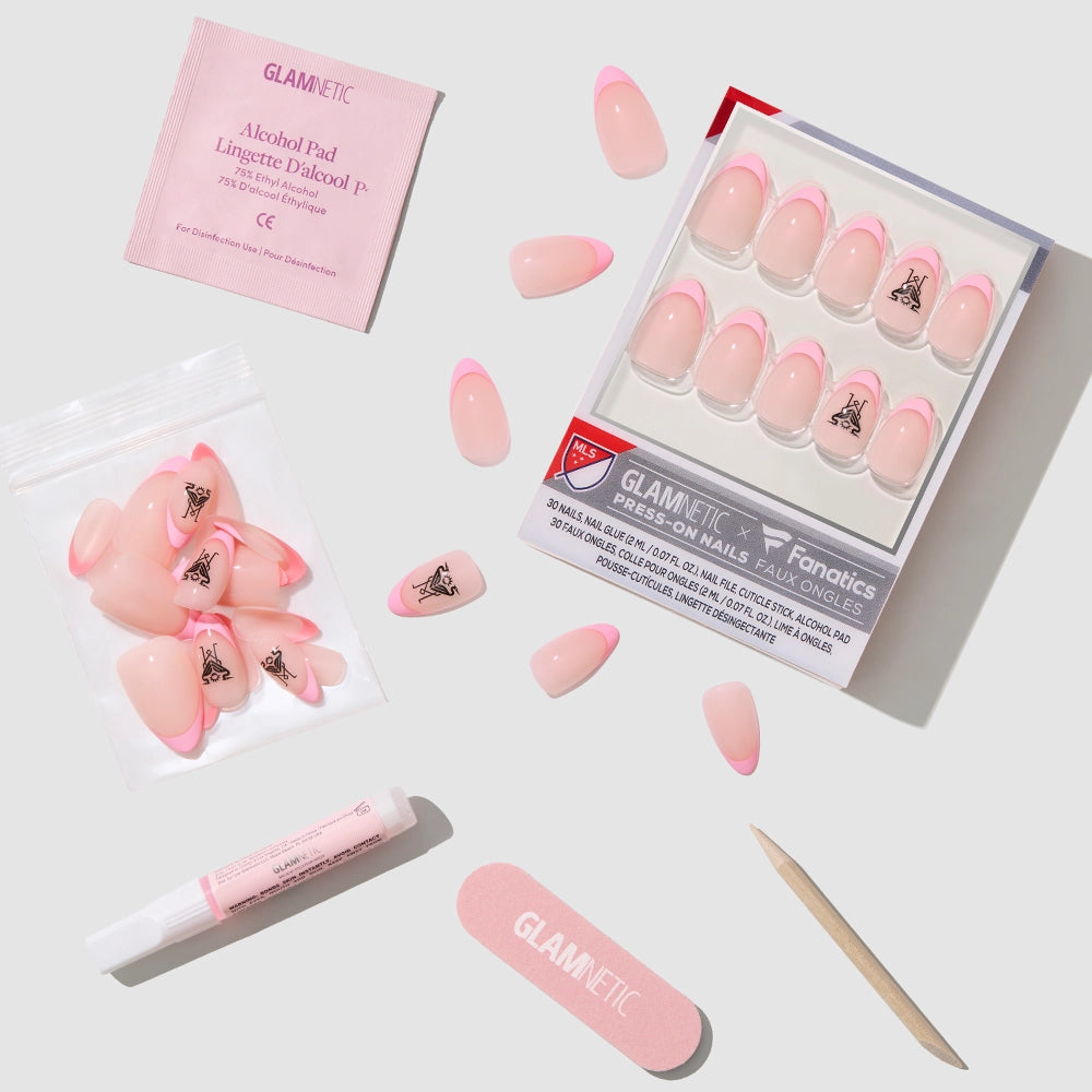 The glamnetic Inter Miami CF Press-On Nail Set features short almond nails with pink French tips and black logos, plus a nail file, cuticle stick, glue, alcohol pad, and extra nails—all displayed on a light gray background. - Product image