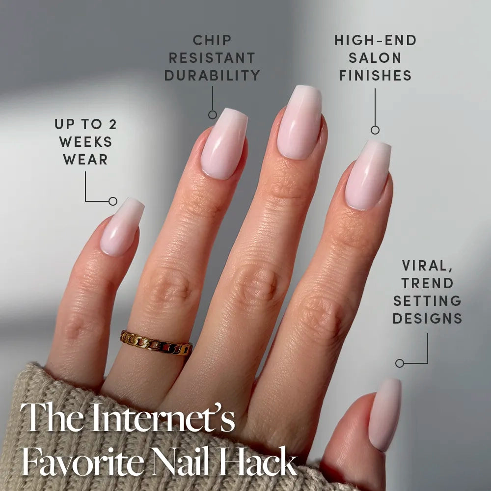 A hand shows medium coffin-shaped, long, pale pink Blush Dream press-on nails by glamnetic. Features up to 2 weeks wear, chip-resistant durability, glossy semi-transparent finish. The Internet’s Favorite Nail Hack is highlighted below. - Product image