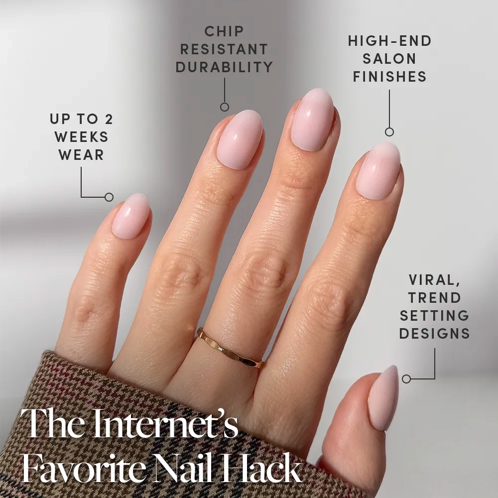 A hand with neatly manicured, pale pink short oval nails in "Doll Cheeks" by glamnetic is shown, featuring chip-resistant durability, salon-quality finish, up to 2 weeks of wear, and viral press-on designs. Text: The Internet’s Favorite Nail Hack. - Product image