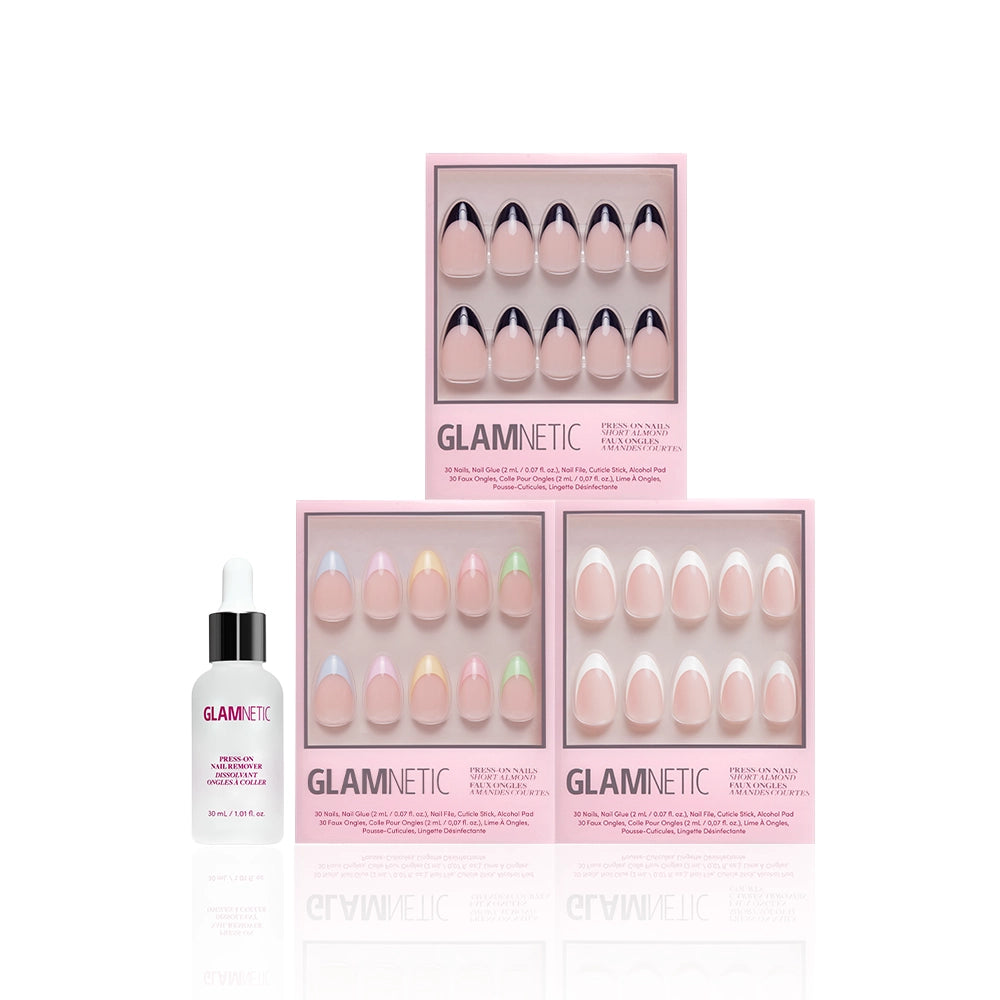 Three boxes from the glamnetic Frenchie Bundle—featuring a variety of pastel-style press-on nails in short almond shapes and chic French tips—are shown alongside a bottle of Glamnetic nail glue with a dropper, all arranged on a white background. - Product image