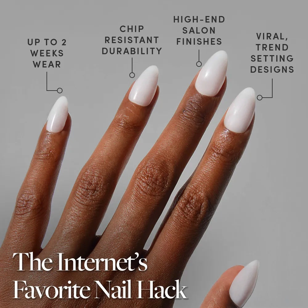 A hand features long, almond-shaped, glossy Milky White press-on nails by glamnetic. Text highlights: up to 2 weeks wear, chip-resistant durability, salon-quality look, and viral designs. Text reads: The Internet’s Favorite Nail Hack. - Product image