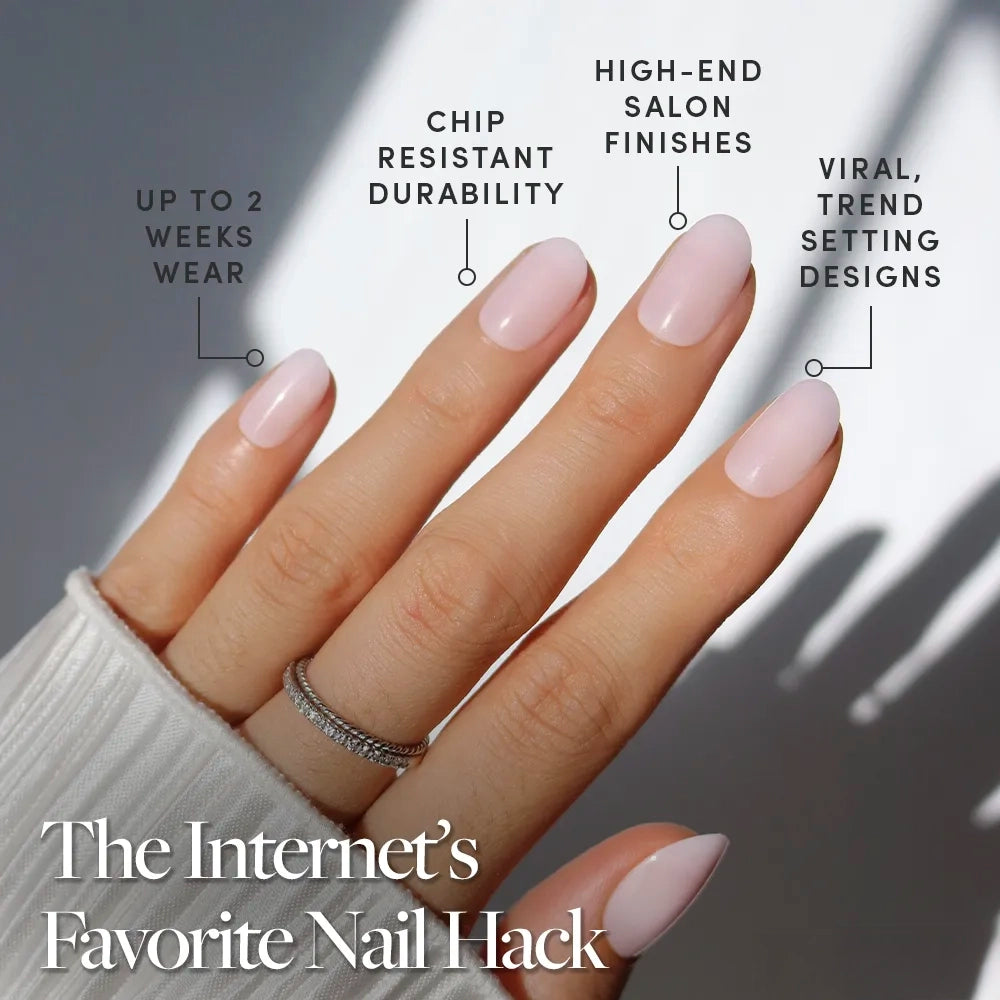 A hand with neatly manicured, light pink nails is shown. glamnetic’s Pink Blush Press-On Nails deliver salon-quality finishes, chip-resistant durability, and up to 2 weeks of wear—the Internet’s favorite hack for viral, trendsetting nails. - Product image