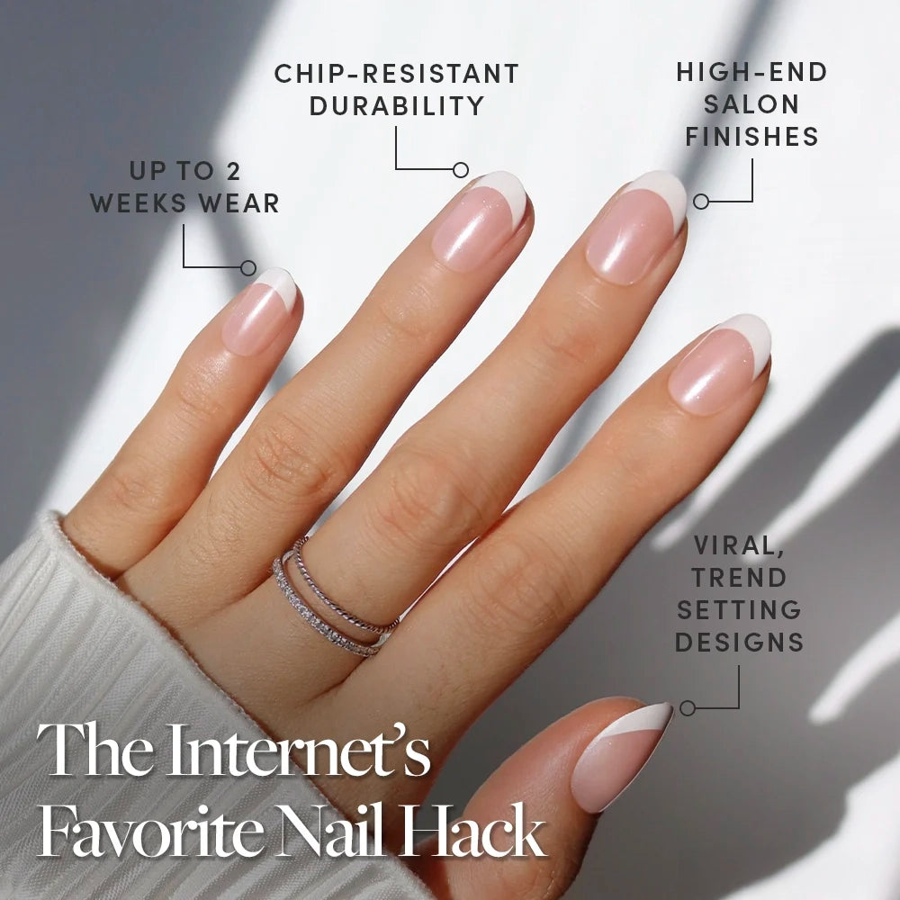 A hand with a pearlescent French tip manicure in glamnetic's "She's a Pearl" is shown, featuring chip-resistant durability, up to 2 weeks wear, salon-quality finish, and viral trend designs. Text: The Internet’s Favorite Nail Hack. - Product image