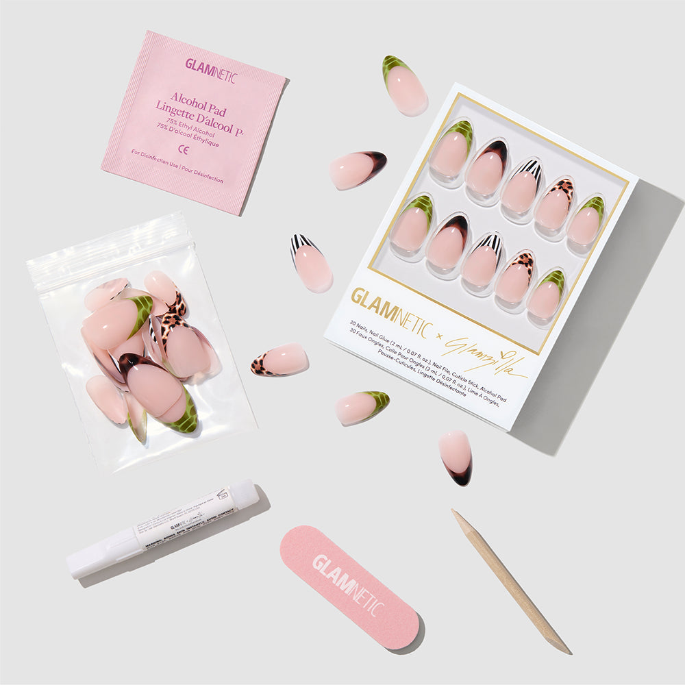 The glamnetic 4 THE GLAMSQUAD set features pink short almond press-on nails with green and animal print tips, a pink nail file, cuticle stick, alcohol pad, nail glue pen, and extra nails arranged on a light gray background. - Product image