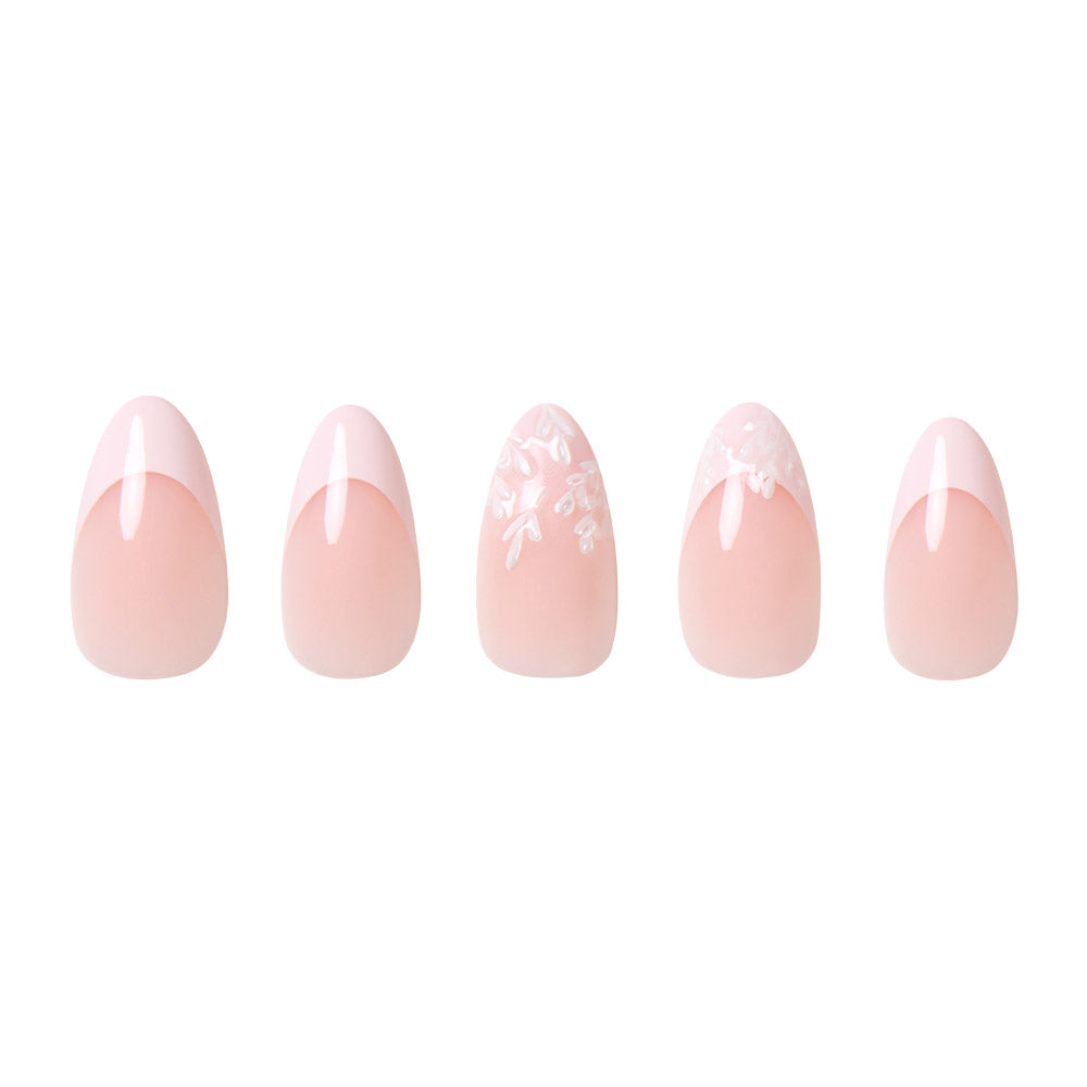 All Time Love by glamnetic: a set of five short almond nails with a nude-pink base—three have pale pink French tips, two feature white floral tip designs. All vegan, cruelty-free, and finished with a glossy shine. - Product image