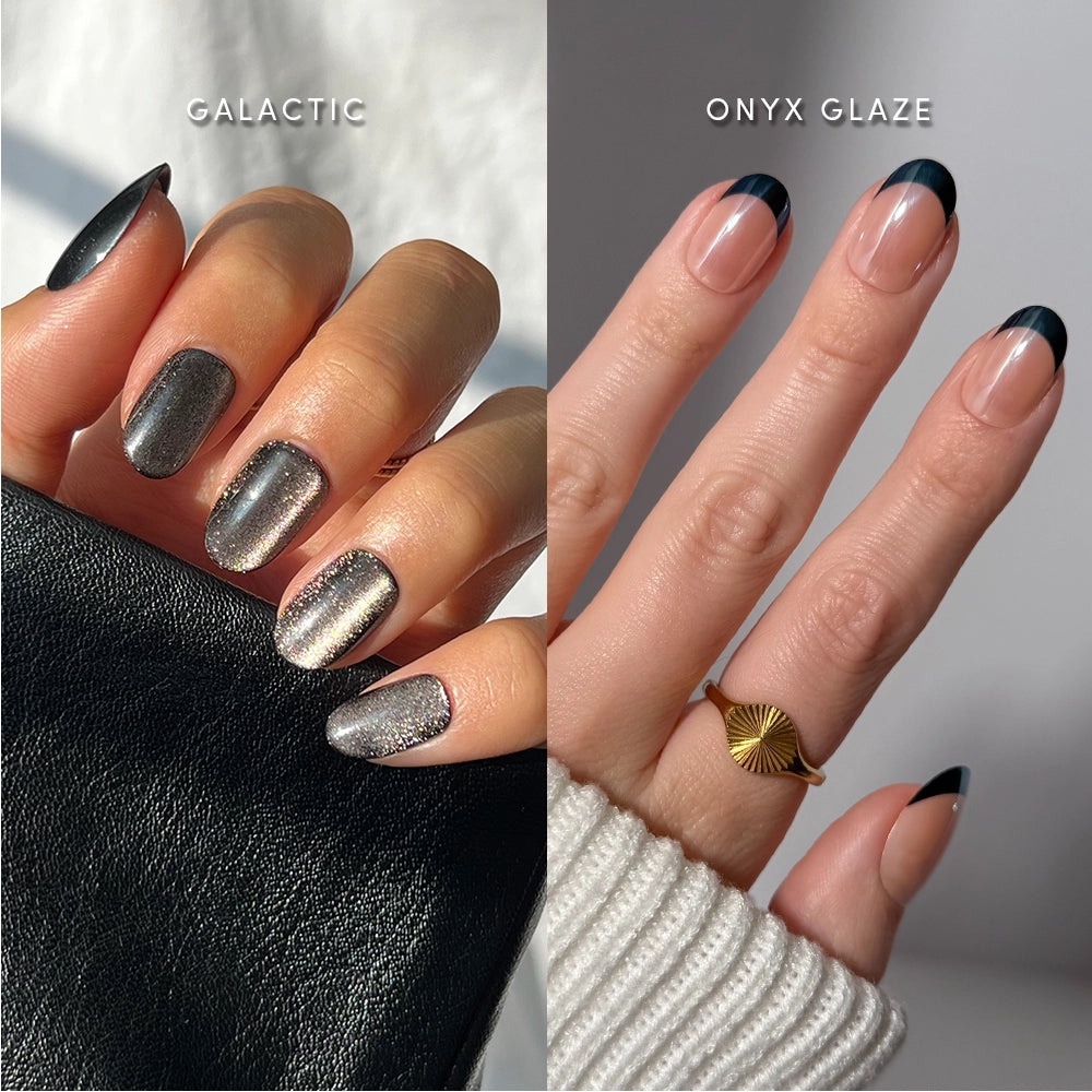Two hands with manicured, short round nails: the left is painted with a shimmery silver polish labeled Galactic, while the right features glamnetic Black to Basics Ovals press-on nails—a nude base with bold black French tips. The right hand’s middle finger is adorned with a gold ring.