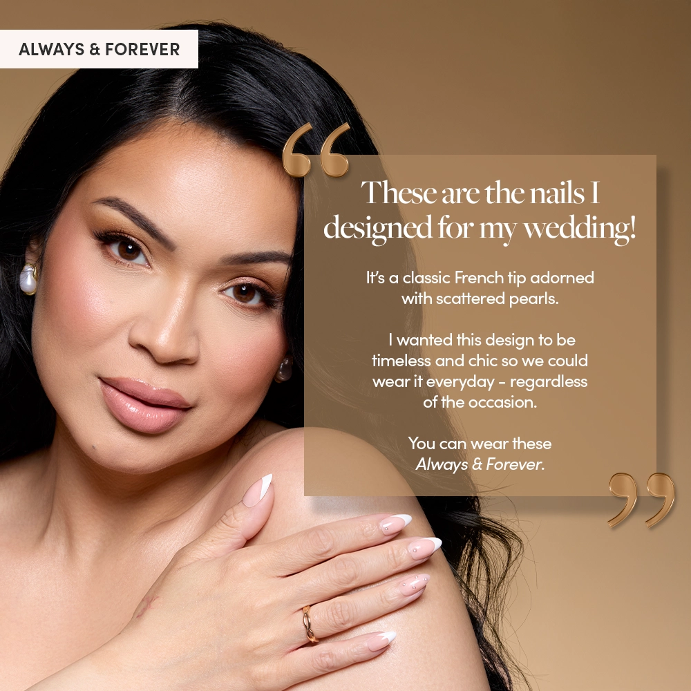 Glamzilla poses with her nails resting gently on her shoulder, showcasing the delicate French tip and pearl designs. A quote overlay reads:
“These are the nails I designed for my wedding!”
She describes the style as timeless, chic, and wearable every day. - Product image