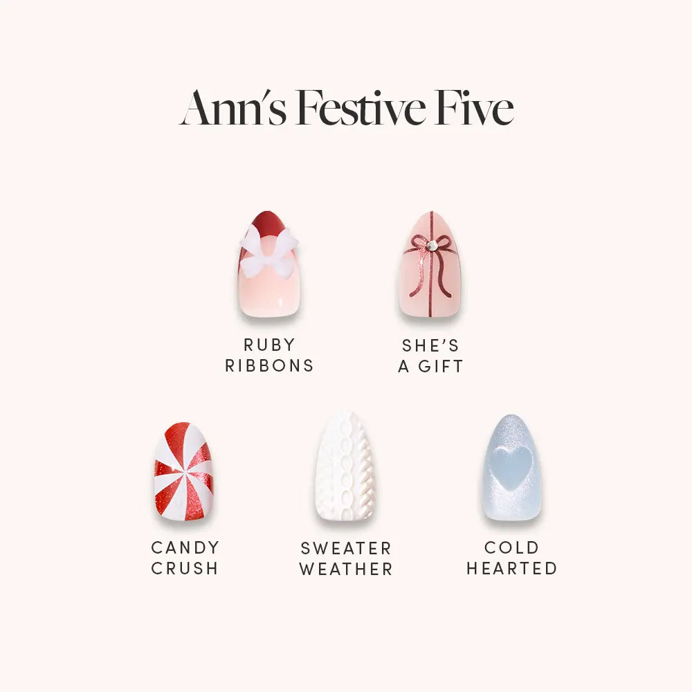 Ann&#39;s Festive Five by glamnetic features party-ready manis: Ruby Ribbons (red ribbon on pink), She’s a Gift (red bow on white), Candy Crush (red/white swirl), Sweater Weather (white knit), and Cold Hearted (blue with heart).