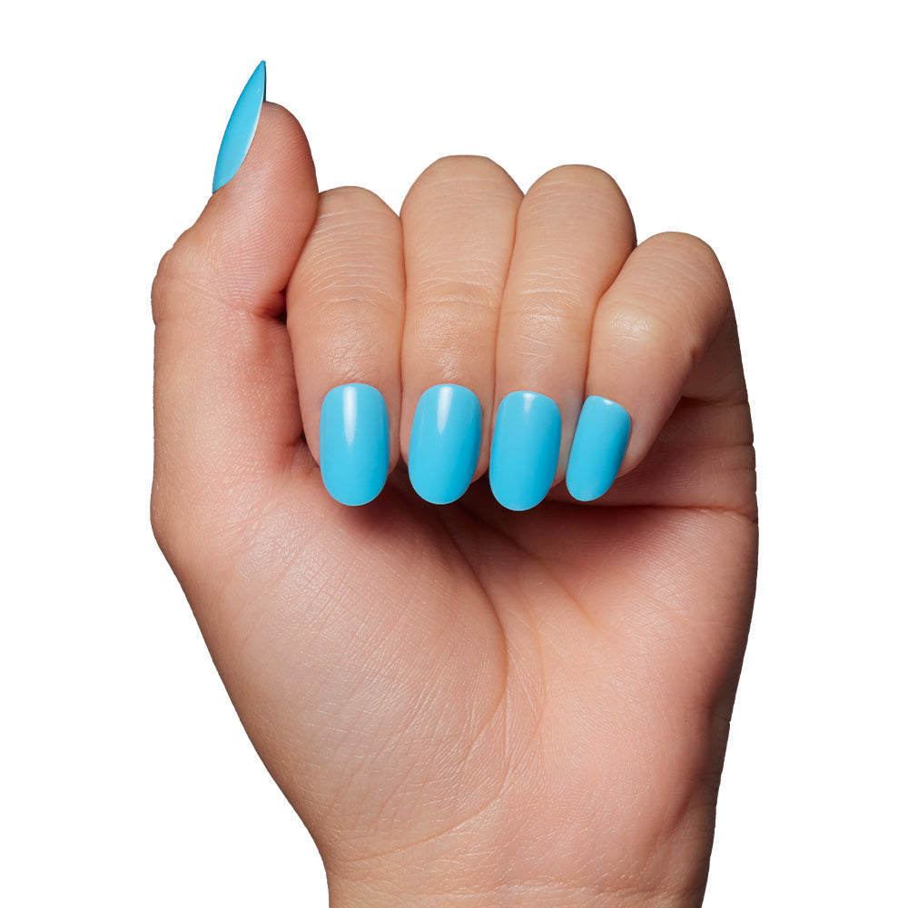 A hand with fingers curled inward displays glamnetic’s Azure Blue nails, featuring a glossy, long-lasting polish that’s perfect for summer fun against a crisp white background. - Product image