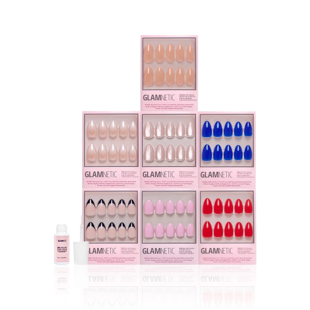 Glamnetic nail product set with various colored magnetic nails and brush-on nail glue on a white background - Product image