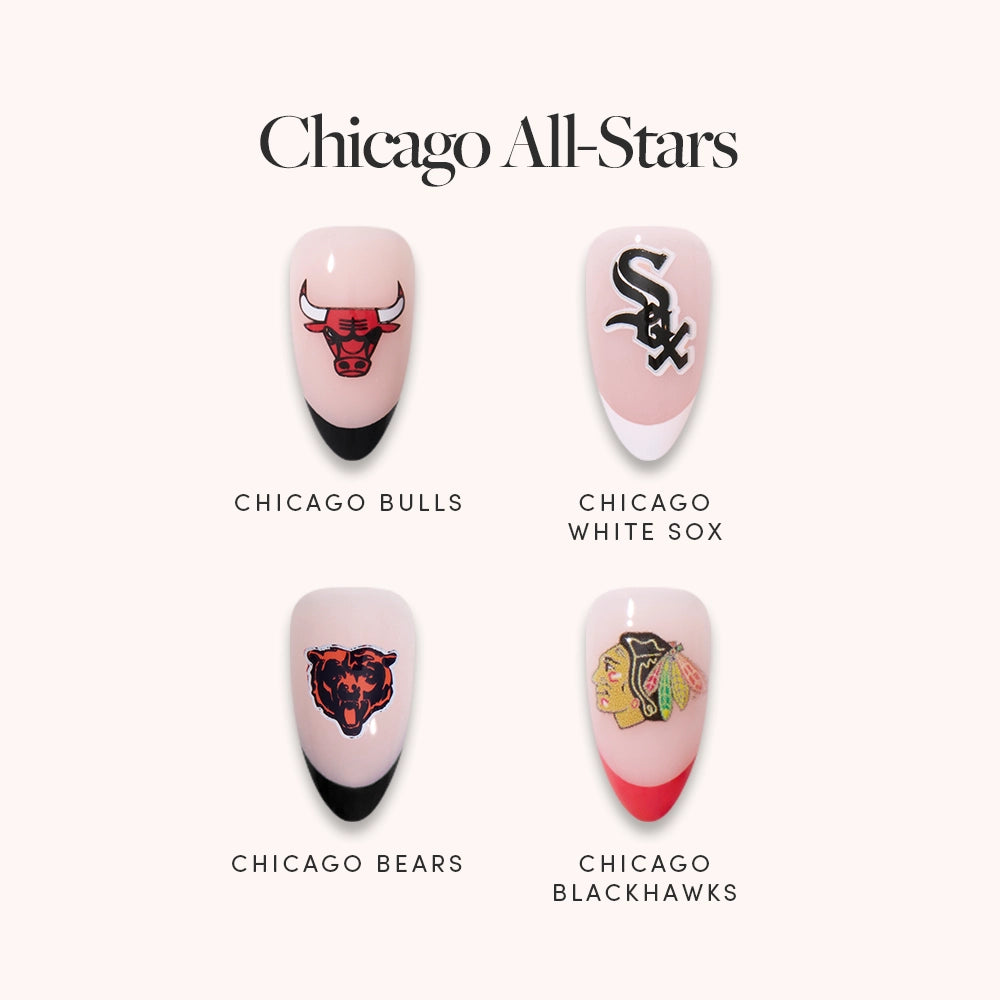 The Chicago All-Stars nail bundle by glamnetic features four artificial nails, each with a Chicago sports team logo—Bulls, White Sox, Bears, and Blackhawks—and matching colored tips.
